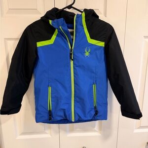 Spyder Kids Puffer Jacket in Blue and Black with Neon Accents